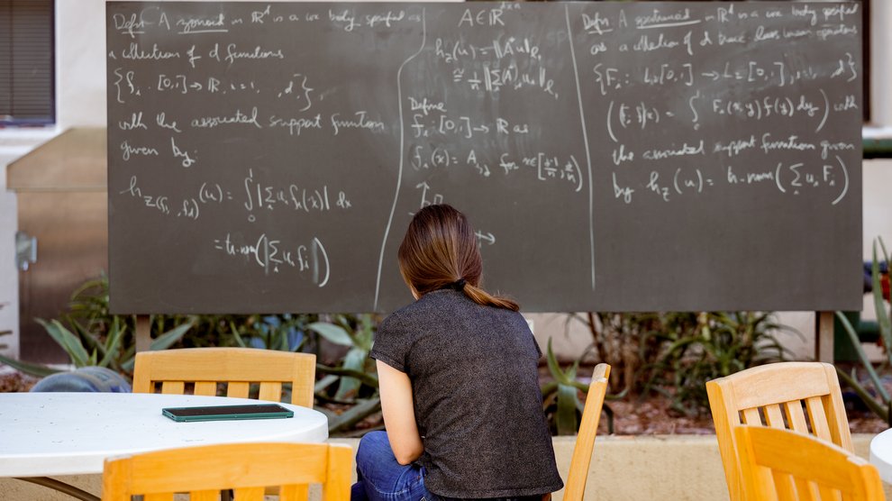 Student studying outdoors.