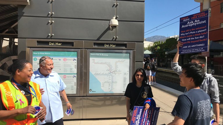 Scientists from Caltech discuss science with transit workers during a Science Train activity.