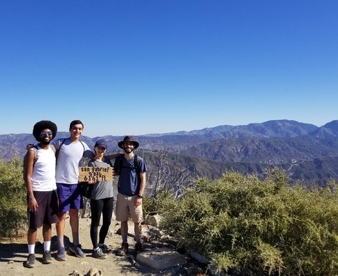 Graduate students Evan Nuñez, Max Goldberg, Samantha Wu, and Henry Peterson on a hike.