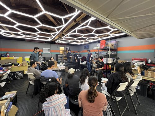 Caltech Racing team meeting in their garage