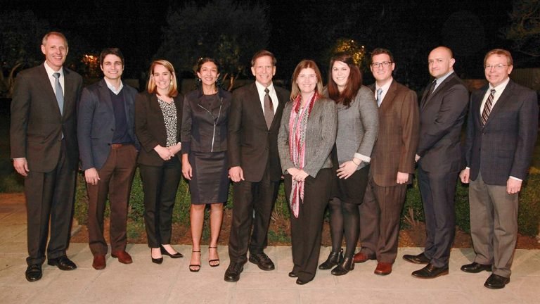 Richard Merkin joined Caltech&#x27;s Heritage Medical Research Institute Investigators, President Thomas F. Rosenbaum, and Provost David Tirrell for a celebration in 2018. From left, Rosenbaum, Mikhail Shapiro, Sarah Reisman, Azita Emami, Merkin, Viviana Gradinaru, Rebecca Voorhees, Mitchell Guttman, Sarkis Mazmanian, and Tirrell.