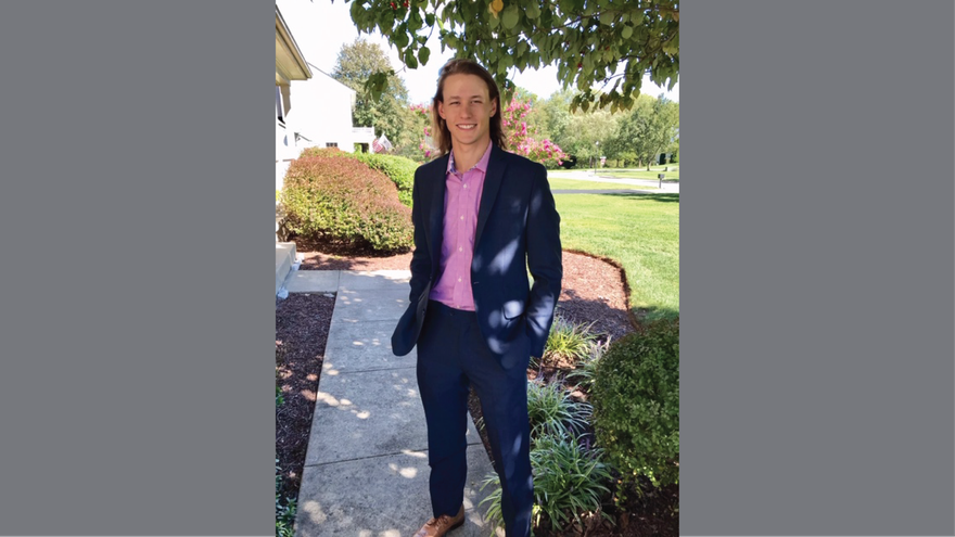 Photo of Matthew Gherman standing outdoors on campus