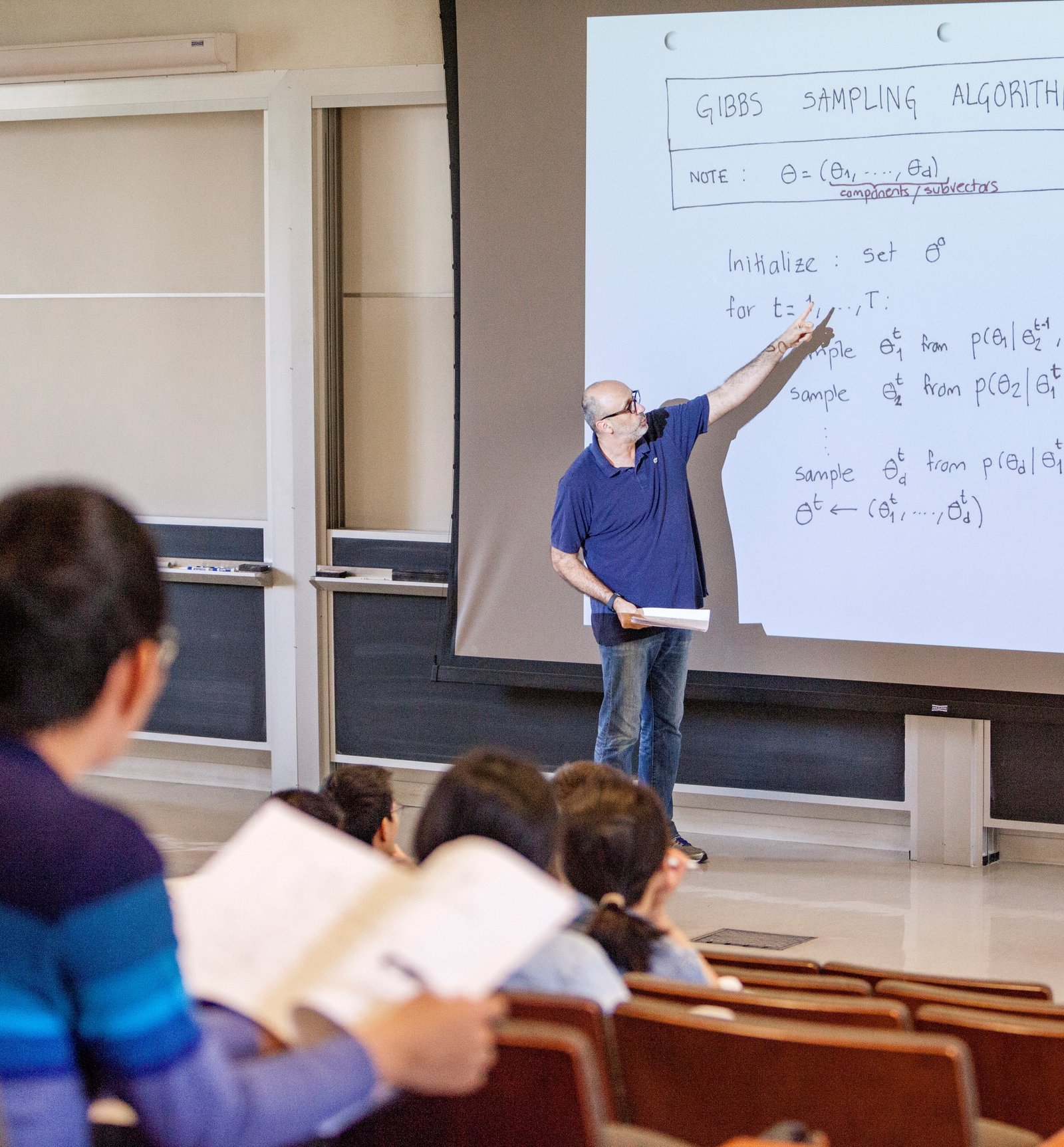 Professor Rangel teaching in baxter lecture hall