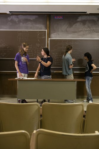 Students and Instructor Working at the Blackboard