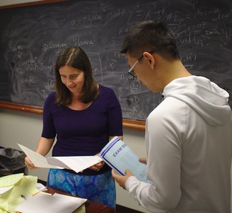 Student and faculty talking