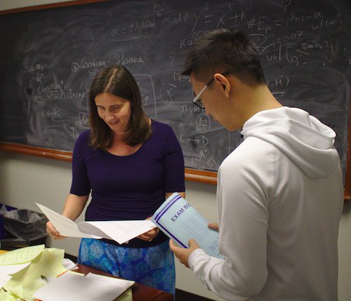 Student and faculty talking