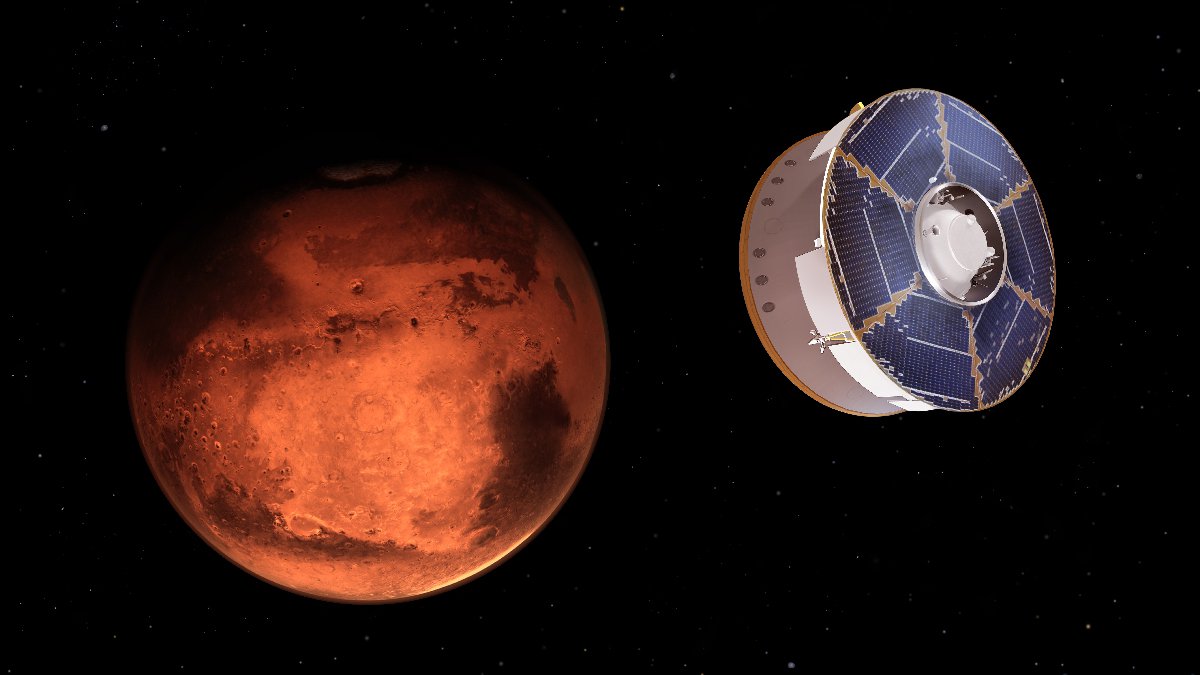 Artist's rendering of a spacecraft with blue solar panels approaching Mars in space.