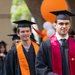 Caltech graduates enter their commencement ceremony wearing caps and gowns