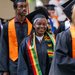 Caltech graduates enter for their commencement ceremony wearing caps and gowns.