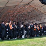 Confetti falls on the graduating class of 2024 at Commencement