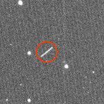 Asteroid 2020 QG appears as a streak.