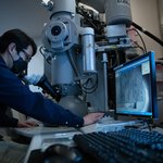 Changsoon Choi working at the electron microscope in Axel Scherer's lab.