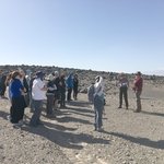 A park ranger and JPL astrobiologist Michael Tuite speak to a group in Death Valley National Park, near Mars Hill