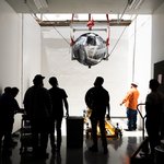 SPHEREx hardware being lowered into a basement lab.