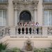Six Girl Scout Brownies smile at the entrance to Caltech's Parsons-Gates Hall of Administration
