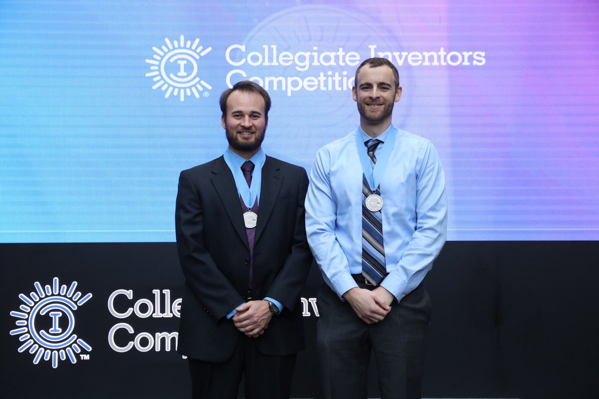 Graduate students Nathan Schoepp and recent graduate Travis Schlappi accept their award at the Collegiate Inventors Competition, held in Alexandria, Virginia, on November 3.