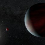 Artist's rendering of two Saturn-sized planets orbiting a Sun-like star.