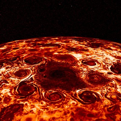 Large storms, each looking like a hurricane, swirl around each other in a false-color image.