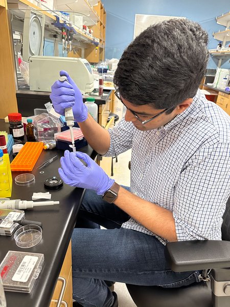 man works in chemistry lab