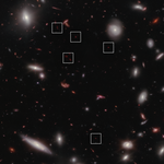 An image of many oval and spiral shaped galaxies