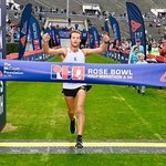 Astrophysics graduate student Adolfo Carvalho crossing the finish line for the Rose Bowl Half Marathon