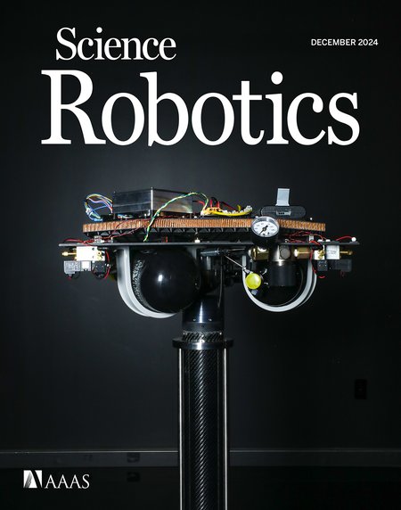 A close-up photo of a robotic system on a dark background. "Science Robotics" is the large header. "December 2024" and "AAAS" are also displayed.