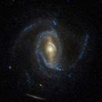 A super spiral galaxy captured by the Hubble Space Telescope.